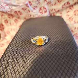 Elegant Gold and Silver Ring with Yellow Gemstone